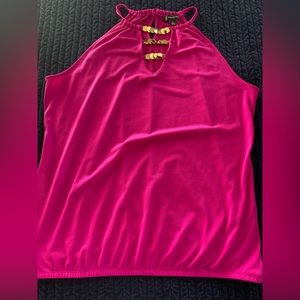 Fun stretch pink and gold hardware top. Fun for a night out! Size XL